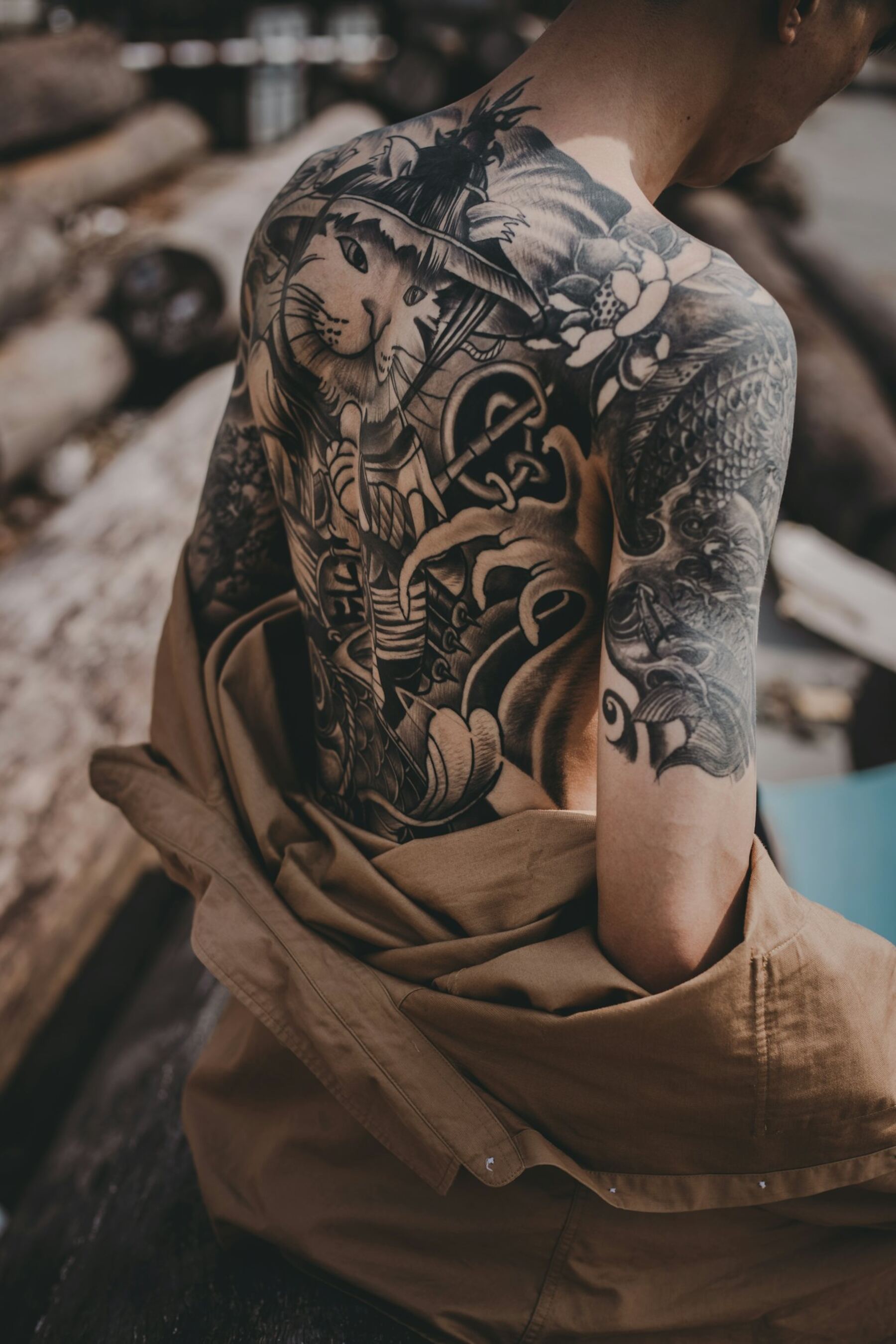 Large black-and-grey back tattoo